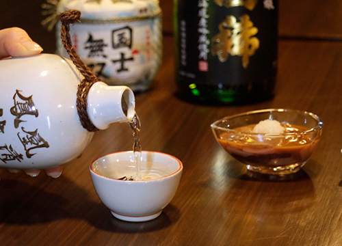 Sake being poured