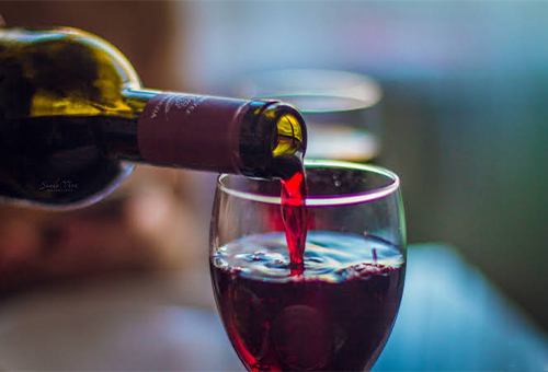 Red wine being poured